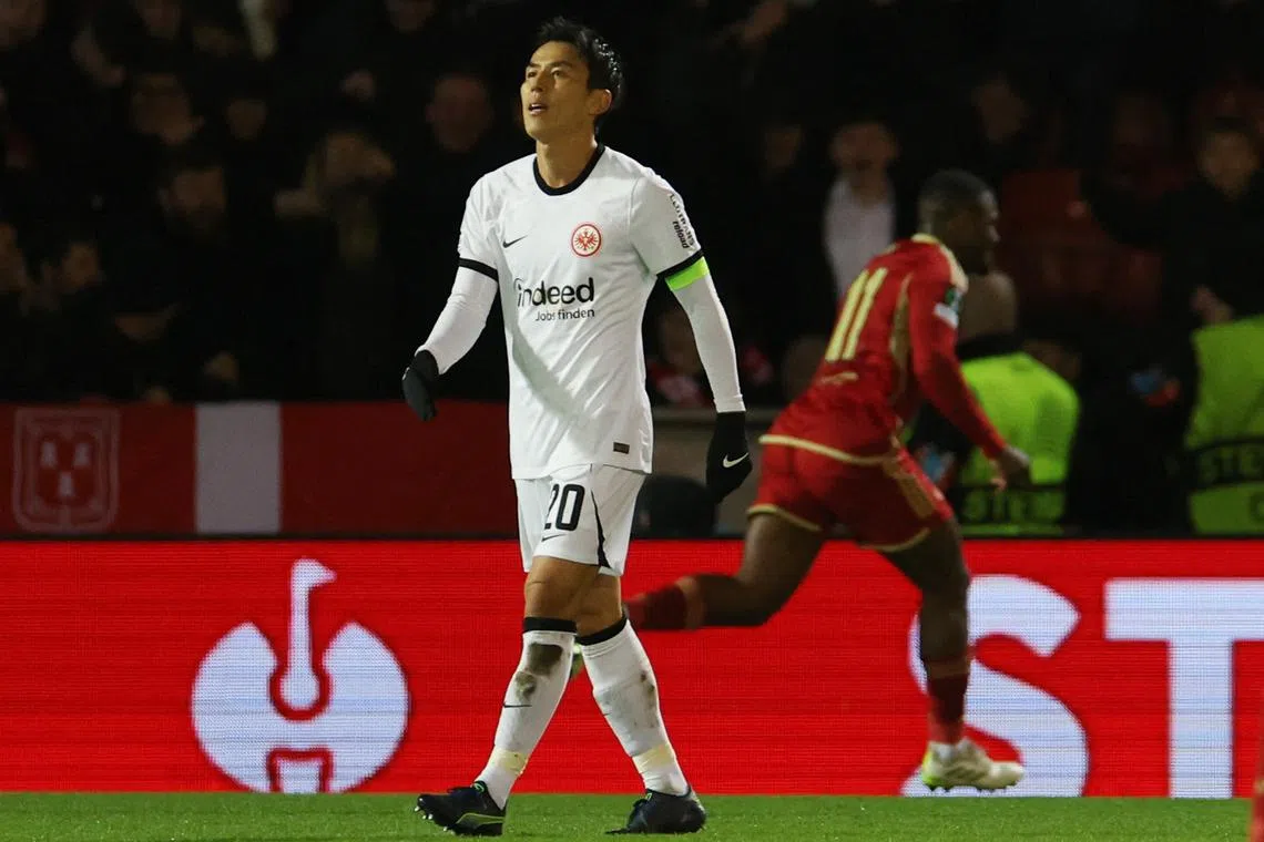 FILE PHOTO: Soccer Football - Europa Conference League - Group G - Aberdeen v Eintracht Frankfurt - Pittodrie Stadium, Aberdeen, Scotland, Britain - December 14, 2023 Eintracht Frankfurt's Makoto Hasebe looks dejected as Aberdeen's Duk celebrates scoring their first goal REUTERS/Russell Cheyne