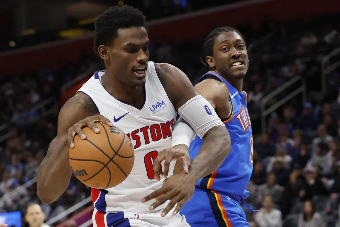 Detroit Pistons centre Jalen Duren being defended by Oklahoma City Thunder forward Jalen Williams in the second half at Little Caesars Arena on Jan 28. The Pistons triumphed 120-104.