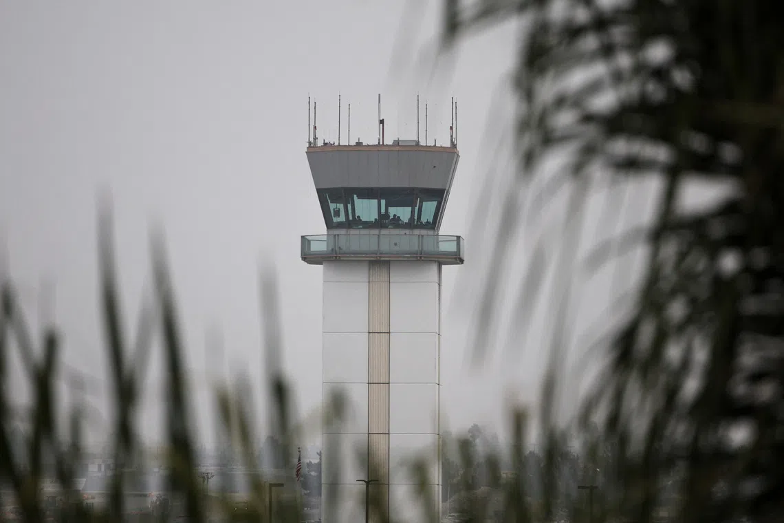 Air traffic controllers resume operations a day after Hollywood Burbank Airport operated for hours without a staffed control tower due to staffing shortages amid the U.S. government shutdown, in Burbank, California, U.S., October 7, 2025. REUTERS/Daniel Cole