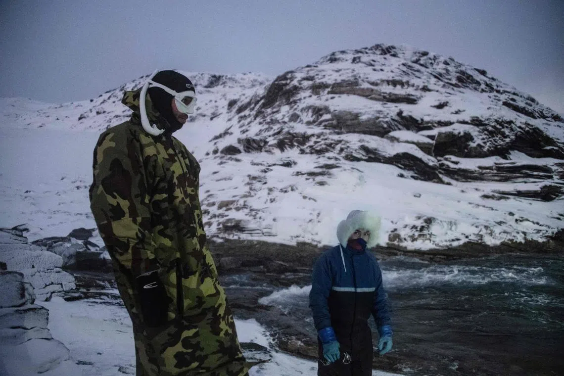 Five times freediving World Champion France's Arthur Guerin-Boeri warm up before dives in the deep to spot Orcas (Killer Whales), in the Spildra Island northern Arctic Circle, on Jan 26, 2023. 