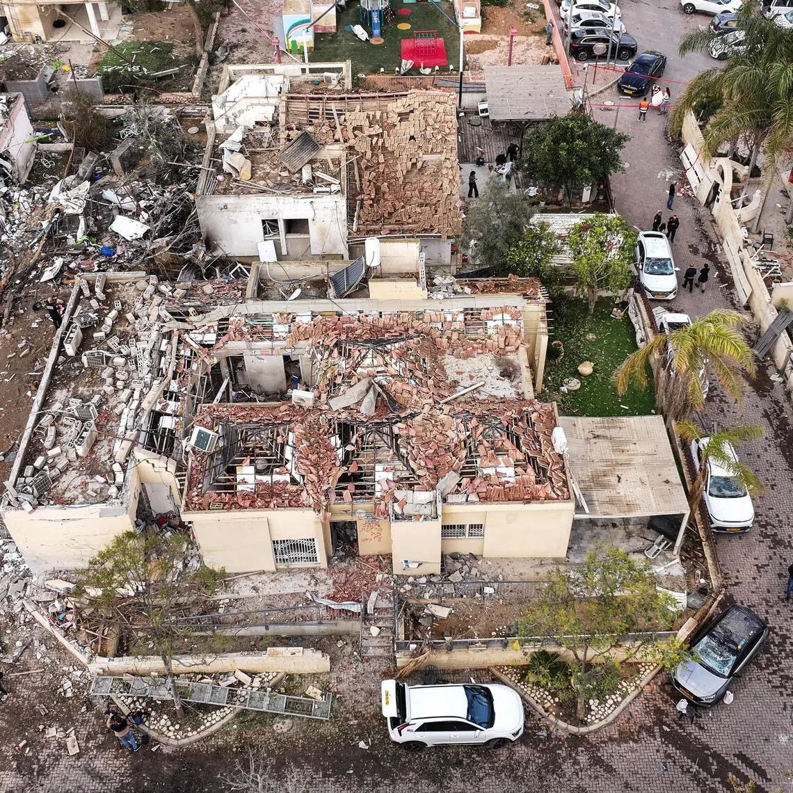 A drone view shows a damage in a residential neighbourhood in Dimona, southern Israel on March 22, 2026.