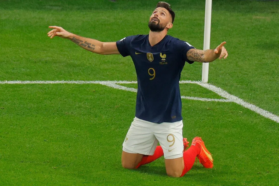 France Olivier Giroud celebrates scoring his team's first goal during their win over Poland on Sunday. 