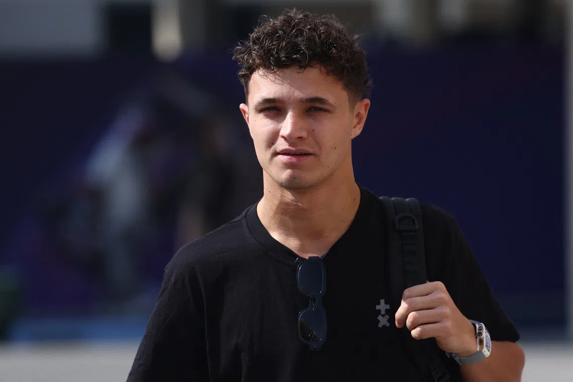 Formula One F1 - Abu Dhabi Grand Prix - Yas Marina Circuit, Abu Dhabi, United Arab Emirates - December 4, 2025 McLaren's Lando Norris arrives ahead of the Abu Dhabi Grand Prix REUTERS/Jakub Porzycki