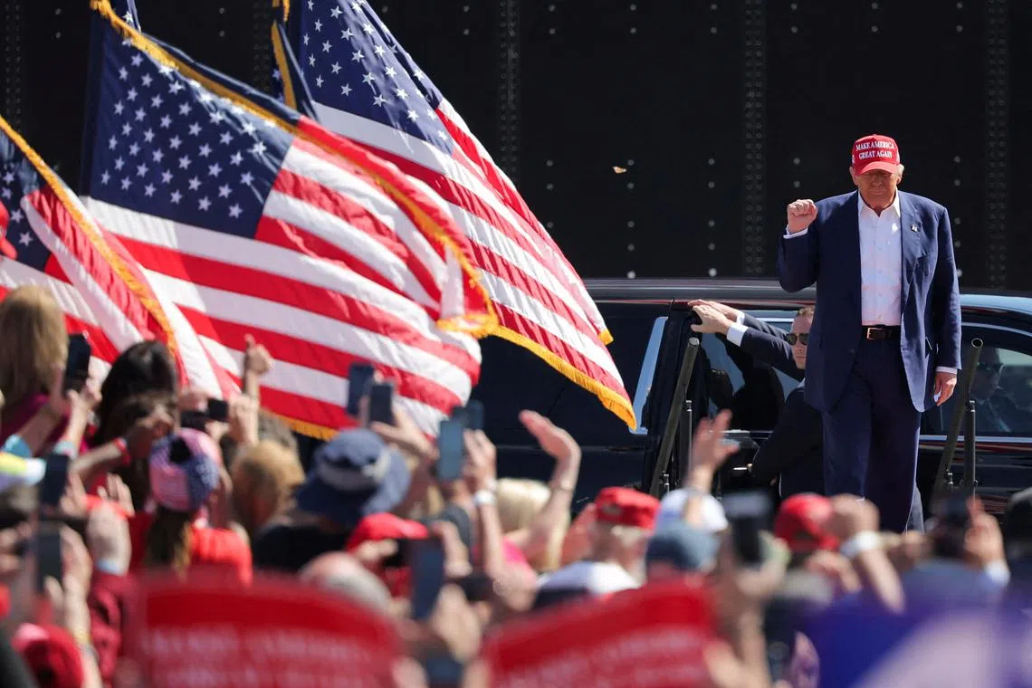 FILE PHOTO: Republican presidential nominee and former U.S. President Donald Trump arrives to hold a campaign rally in Wilmington, North Carolina, U.S., September 21, 2024.  REUTERS/Carlos Barria/File Photo
