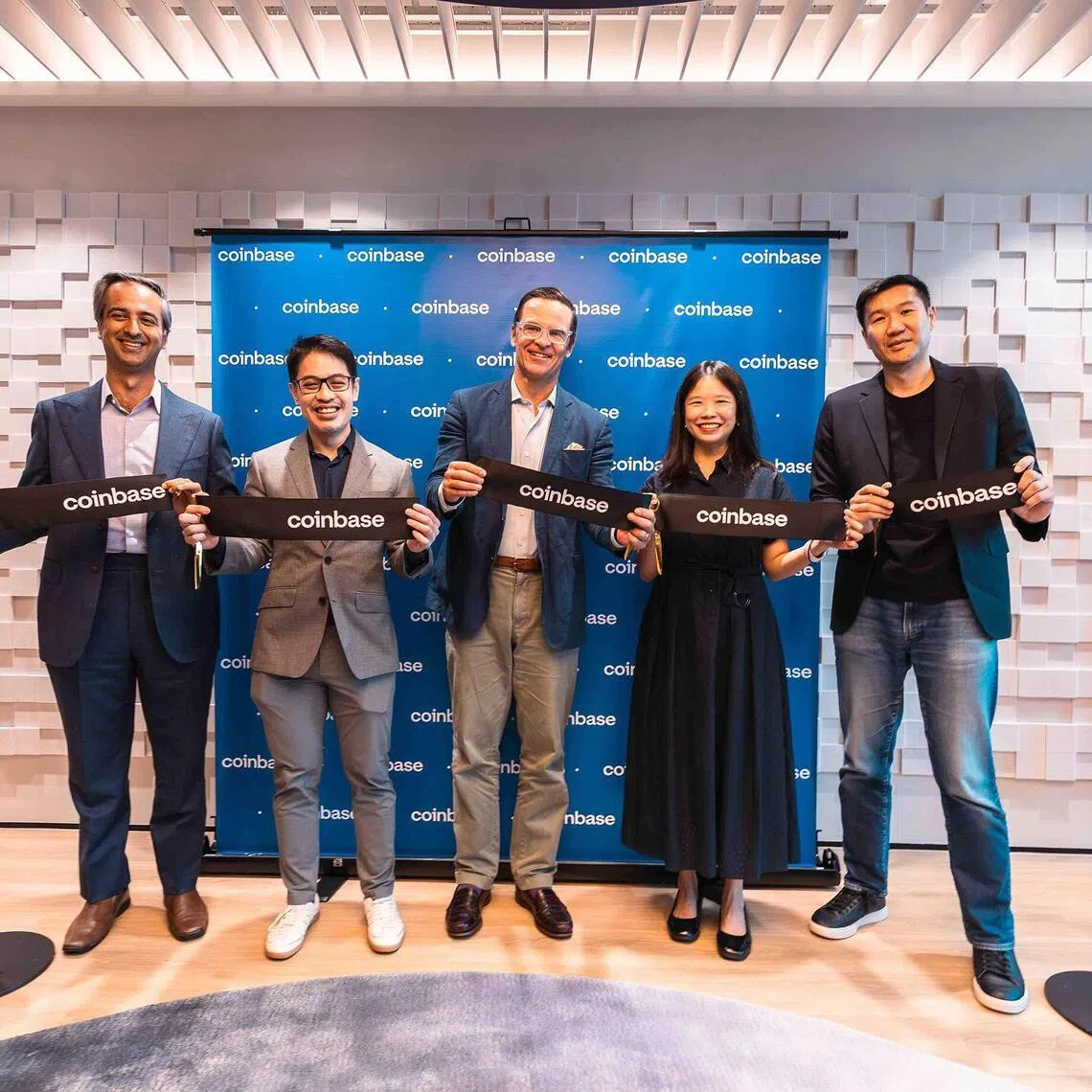 (From left) Coinbase country director for Singapore Hassan Ahmed, chief fintech officer at MAS Kenneth Gay, Coinbase managing director for Asia-Pacific John O’Loghlen, VP of Digital Industry Singapore at Economic Development Board Seah Yueh Chinn, Coinbase senior director of engineering David Ko at the opening of Coinbase’s Singapore office.