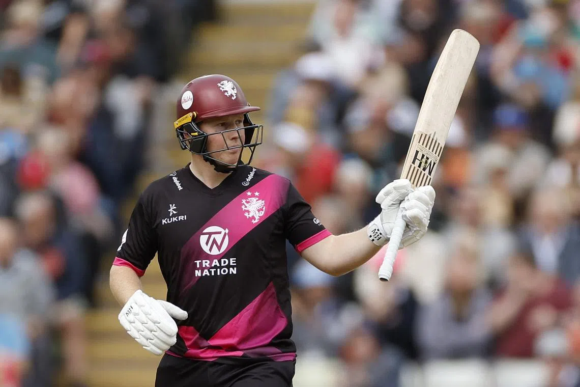 FILE PHOTO: Cricket - Vitality Blast - Semi Final - Surrey v Somerset - Edgbaston Cricket Ground, Birmingham, Britain - September 14, 2024 Somerset's James Rew celebrates his half century Action Images via Reuters/Jason Cairnduff/File Photo