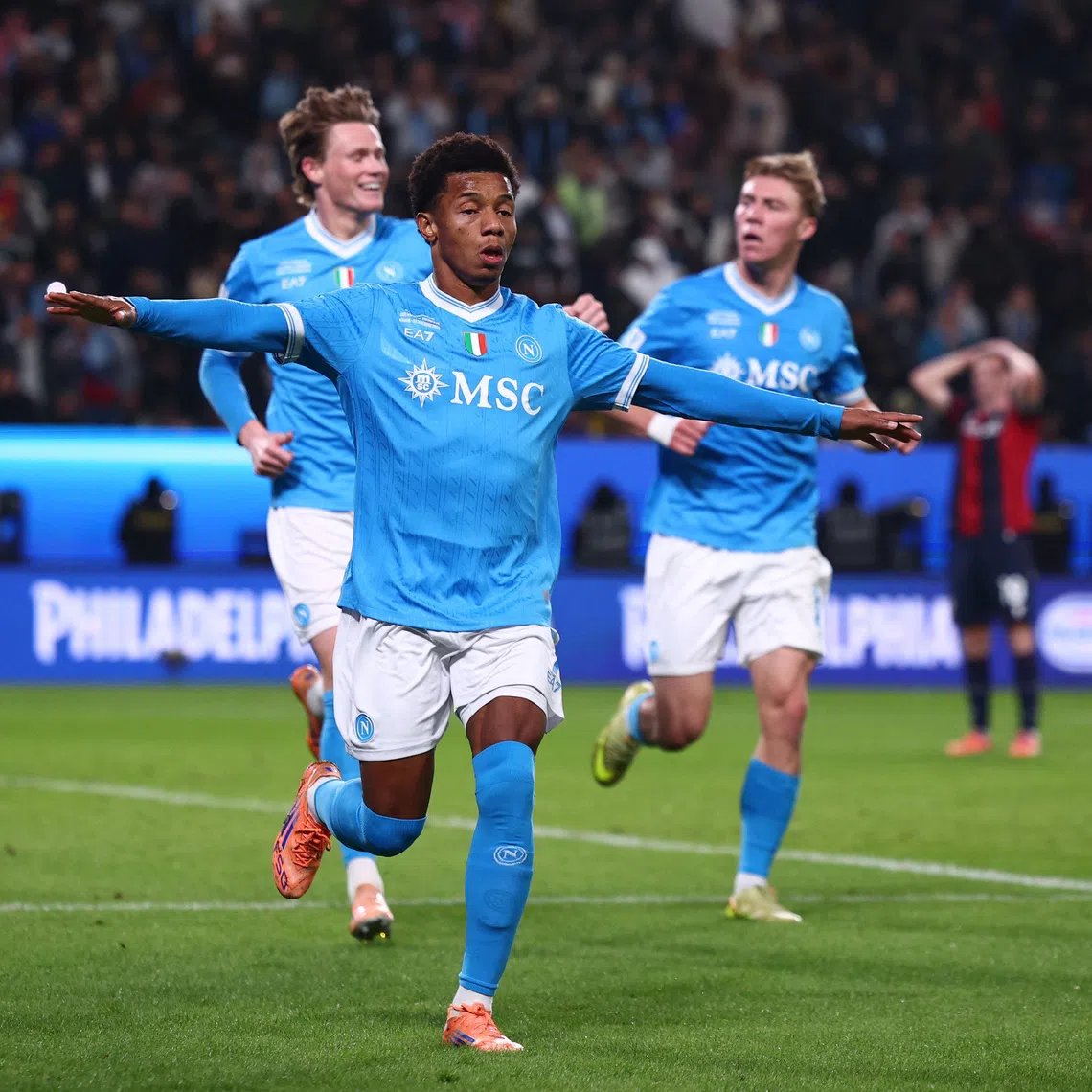 Soccer Football - Supercoppa Italiana - Final - Napoli v Bologna - Al Awwal Park, Riyadh, Saudi Arabia - December 22, 2025 Napoli's David Neres celebrates scoring their second goal REUTERS/Guglielmo Mangiapane
