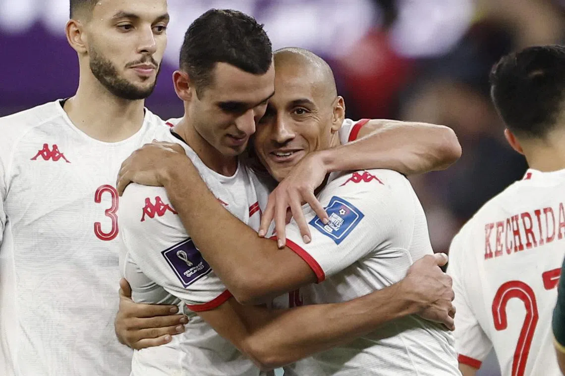Tunisia's Wahbi Khazri and Ellyes Skhiri looks dejected after the match as Tunisia are eliminated from the World Cup.