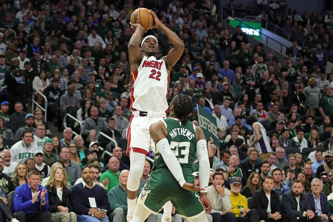 Jimmy Butler of the Miami Heat shoots over Wesley Matthews of the Milwaukee Bucks during the second half of Game 5 of their NBA play-offs.