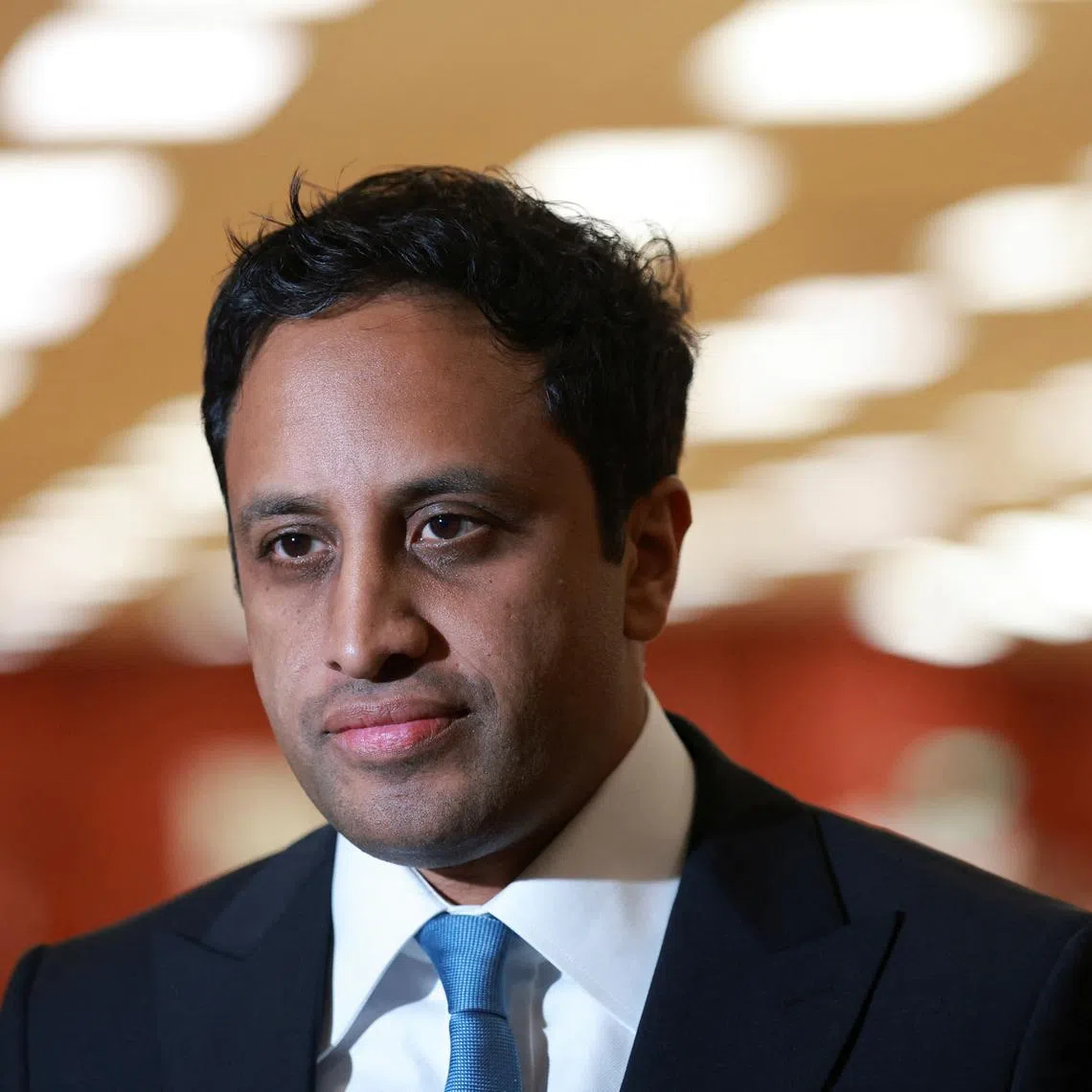 Zia Yusuf, Chairman of the Reform party, looks on as he is interviewed by the media on the day of the Runcorn and Helsby by-election, in Widnes, Britain, May 1, 2025. REUTERS/Phil Noble/File Photo