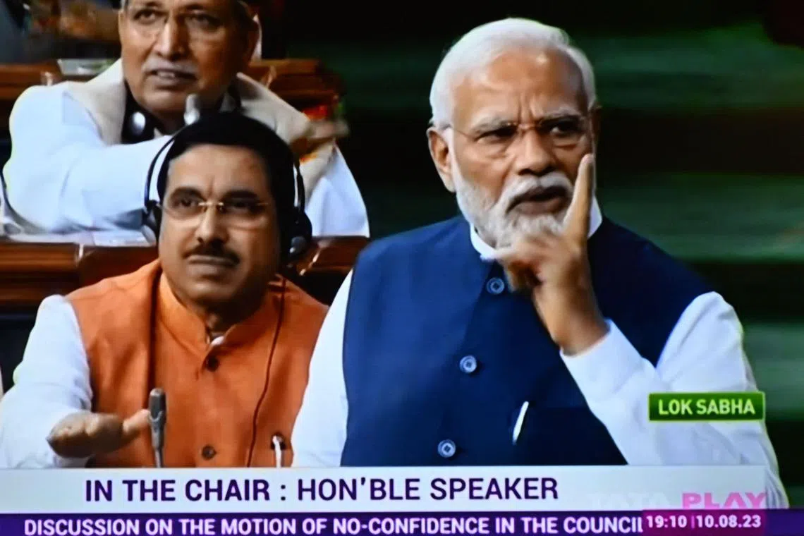 Prime Minister Narendra Modi easily defeated a vote of no-confidence, and delivered a two-hour speech laced with nationalism and rhetorical flourishes.