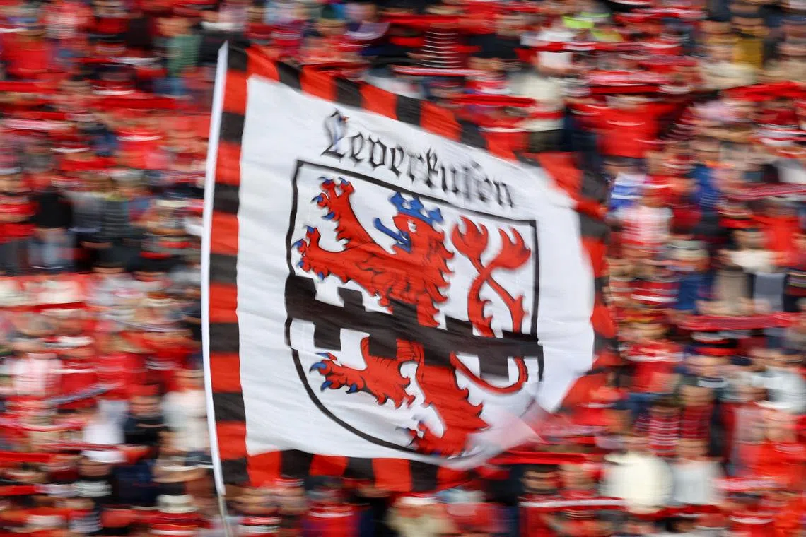 FILE PHOTO: Soccer Football - Bundesliga - Bayer Leverkusen v Schalke 04 - BayArena, Leverkusen, Germany - October 8, 2022 General view of a Bayer Leverkusen flag before the match REUTERS/Kai Pfaffenbach/ File Photo