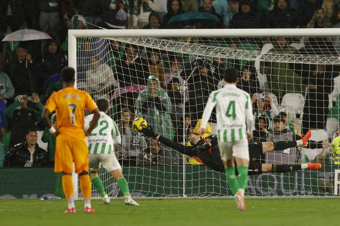 Soccer Football - LaLiga - Real Betis v Real Madrid - Estadio Benito Villamarin, Seville, Spain - March 1, 2025 Real Betis' Isco scores their second goal from the penalty spot REUTERS/Marcelo Del Pozo