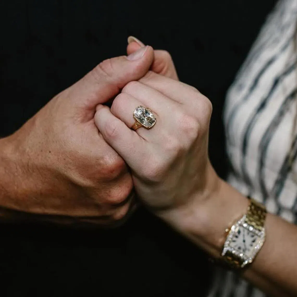 Taylor Swift's bespoke ring featured a cushion-cut old mine diamond, rounded at the corners, and bezel-set in a hand-engraved gold band.