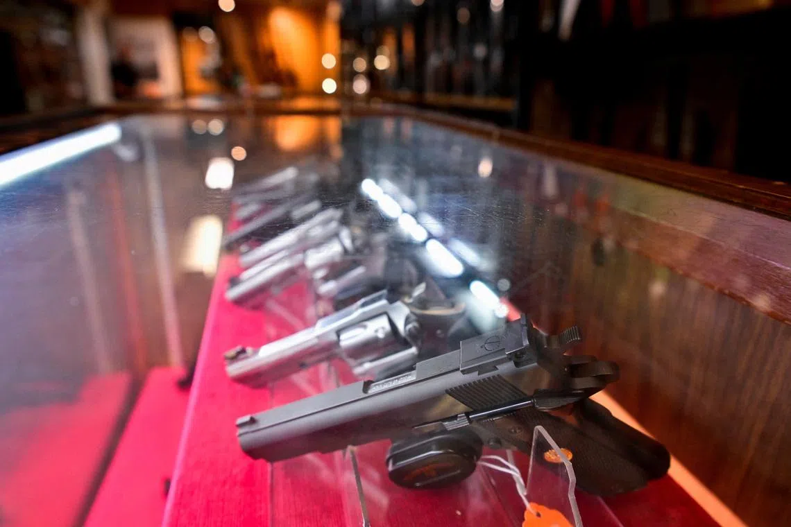 A display of handguns is seen at Wanstall's Hunting & Shooting after Canada's government introduced legislation to implement a \"national freeze\" on the sale and purchase of handguns, as part of a gun control package that would also limit magazine capacities and ban some toys that look like guns, in Maple Ridge, British Columbia, Canada May 31, 2022. REUTERS/Jennifer Gauthier