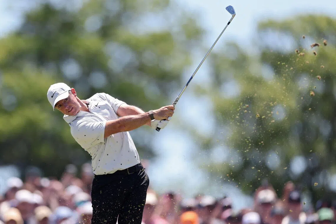 Rory McIlroy hitting an approach shot on the eighth hole during the third round of the PGA Championship on May 16.