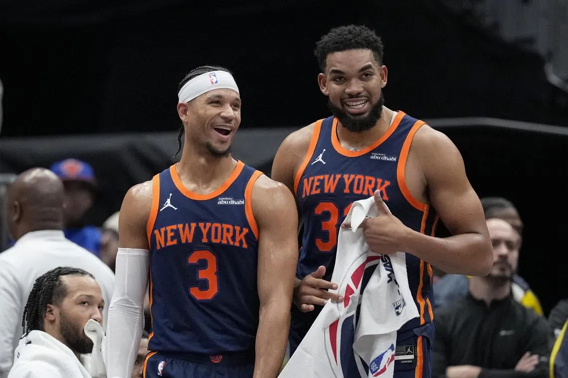 Josh Hart (left) and Karl-Anthony Towns, seen here smiling during the New York Knicks' win over the Washington Wizards on Dec 30, both played starring roles in the Knicks' 119-103 NBA triumph over the Utah Jazz on Jan 1.
