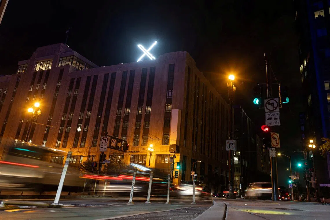 FILE PHOTO: 'X' logo is seen on the top of the headquarters of the messaging platform X, in downtown San Francisco, California, U.S., July 30, 2023. REUTERS/Carlos Barria/File Photo