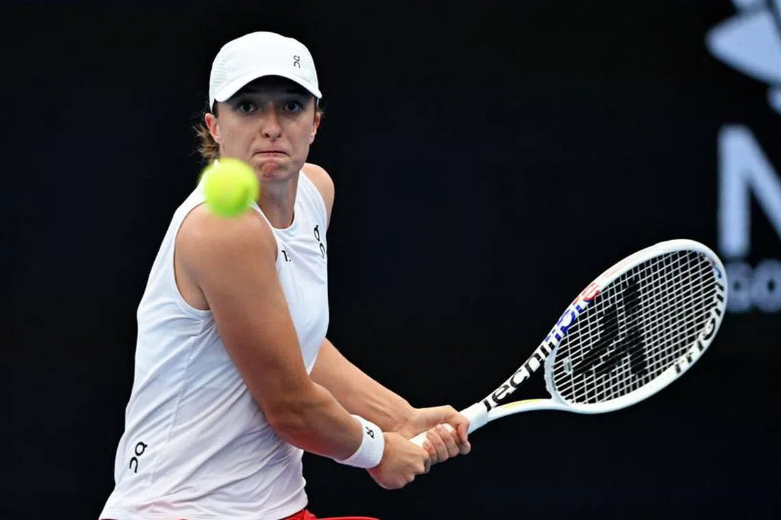 Tennis - United Cup - Ken Rosewall Arena, Sydney, Australia - January 6, 2024 Poland's Iga Swiatek in action during her singles semi-final match against France's Caroline Garcia REUTERS/Jaimi Joy