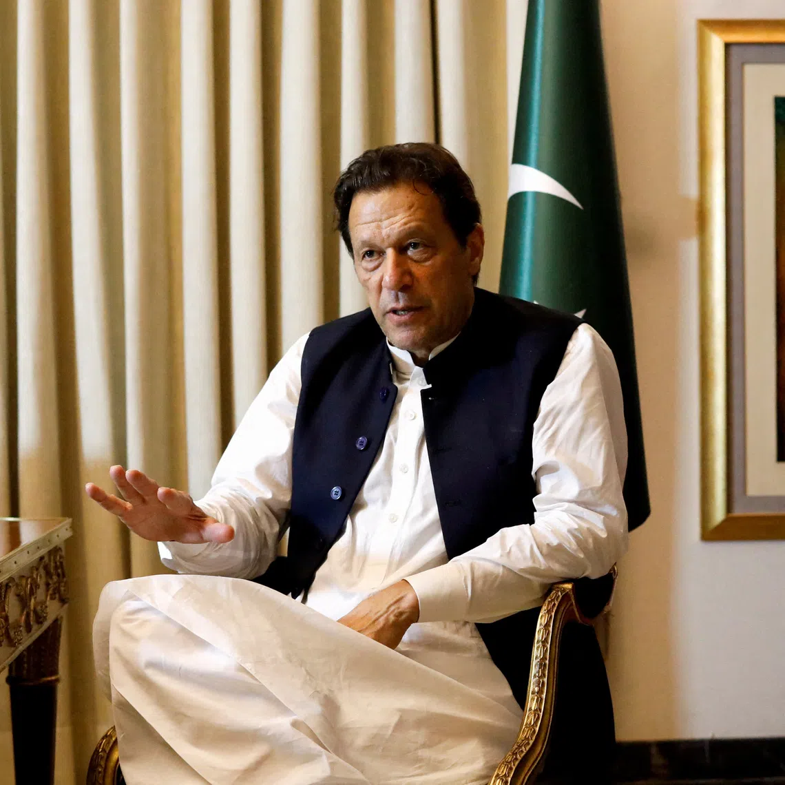 FILE PHOTO: Former Pakistani Prime Minister Imran Khan speaks with Reuters during an interview, in Lahore, Pakistan March 17, 2023. REUTERS/Akhtar Soomro/File Photo