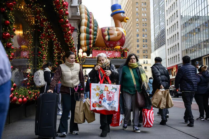 Shoppers outside the Macy’s flagship store in Midtown Manhattan.  