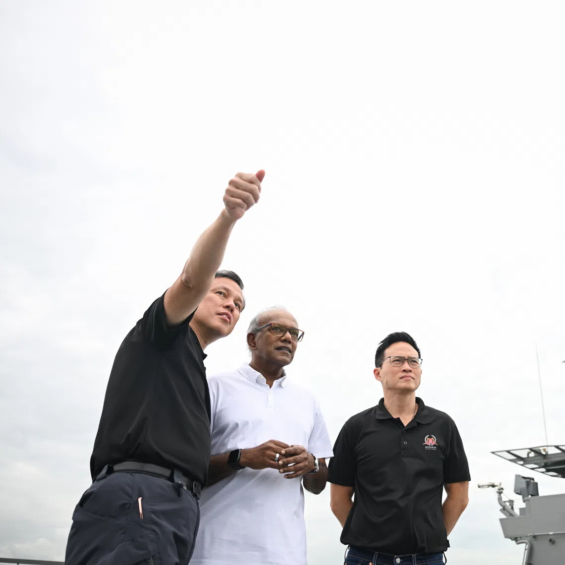 Coordinating Minister for National Security and Minister for Home Affairs K. Shanmugam (centre) with Defence Minister Chan Chun Sing (left) and Minister of State for Defence Desmond Choo at Exercise Highcrest on Nov 28.