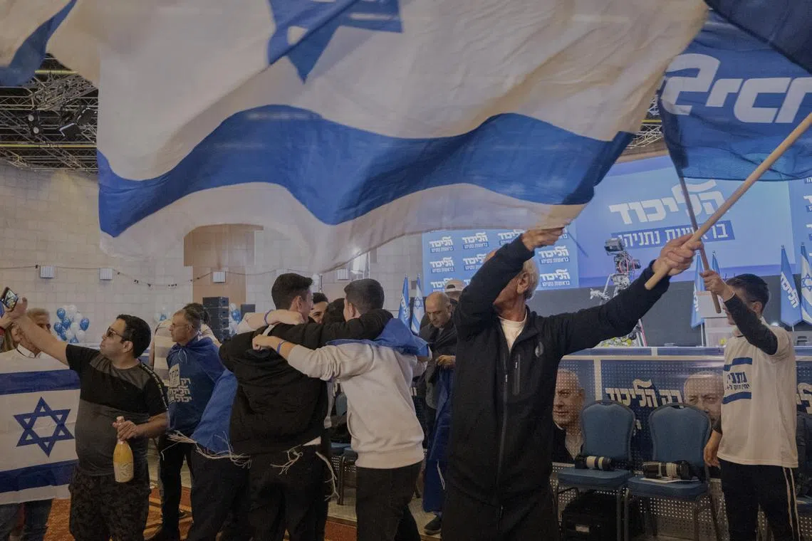 Supporters of returning premier Benjamin Netanyahu's Likud party celebrate in Jerusalem, on November 1, 2022. 