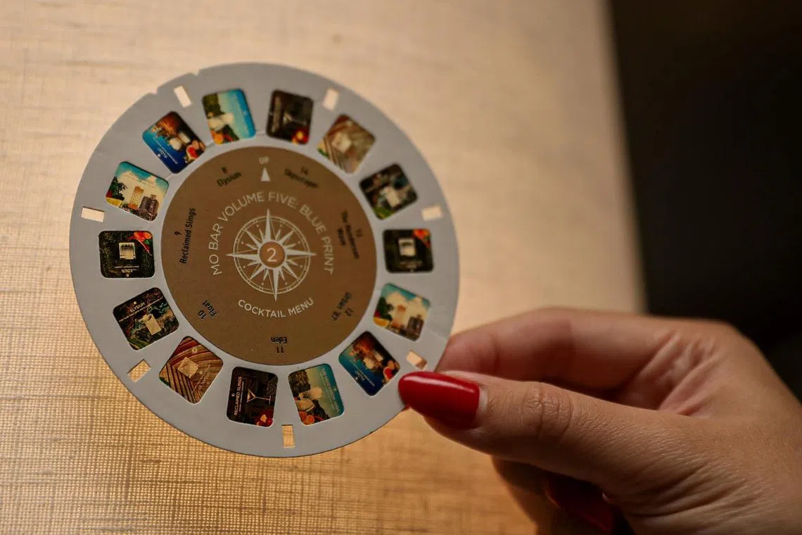 ST20241010_202447200538/clmenu/Luther Lau/Cherie Lok/
Close up shot of the Menu designs that MOBAR uses when customers order drinks. Taken at 5 Raffles ave.