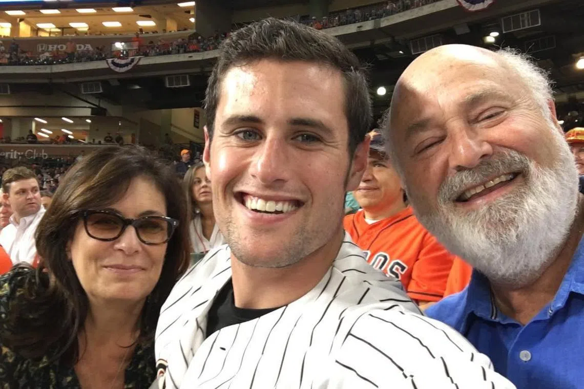 Jake Reiner with his parents Rob and Michele Reiner in a photo posted on social media in 2017. 