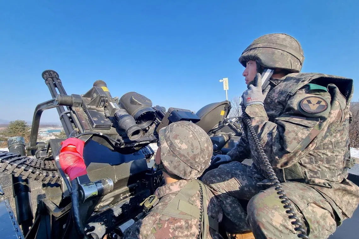 South Korean soldiers with 20mm vulcan cannon take part in an anti-drone drill in Yangju, South Korea, in this handout picture provided by the South Korean Defence Ministry on December 29, 2022.   The South Korean Defence Ministry/Handout via REUTERS   ATTENTION EDITORS - THIS IMAGE HAS BEEN SUPPLIED BY A THIRD PARTY.