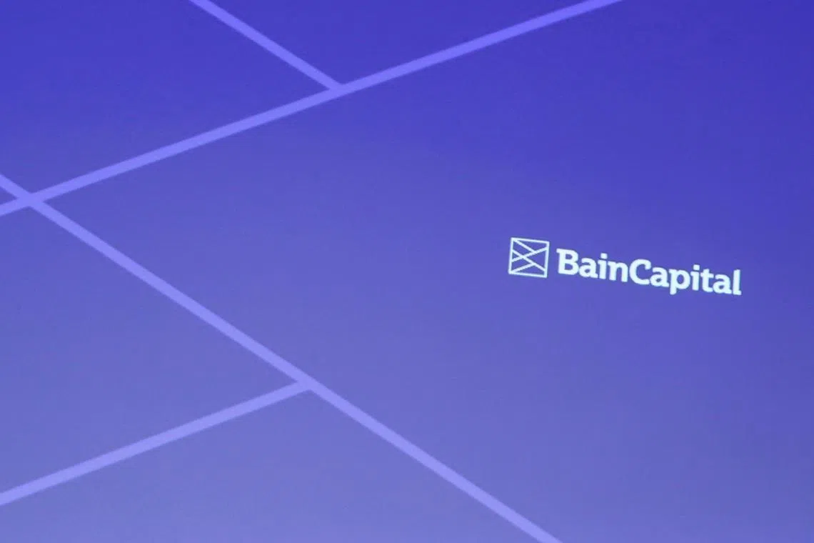 FILE PHOTO: Logo of Bain Capital is screened at a news conference in Tokyo, Japan September 28, 2017. REUTERS/Kim Kyung-Hoon/File Photo