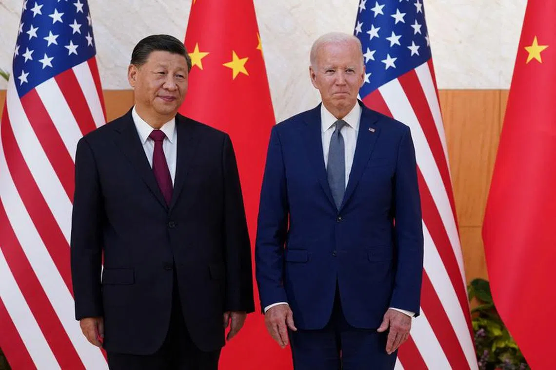 U.S. President Joe Biden meets with Chinese President Xi Jinping on the sidelines of the G20 leaders' summit in Bali, Indonesia, November 14, 2022.  REUTERS/Kevin Lamarque/File Photo