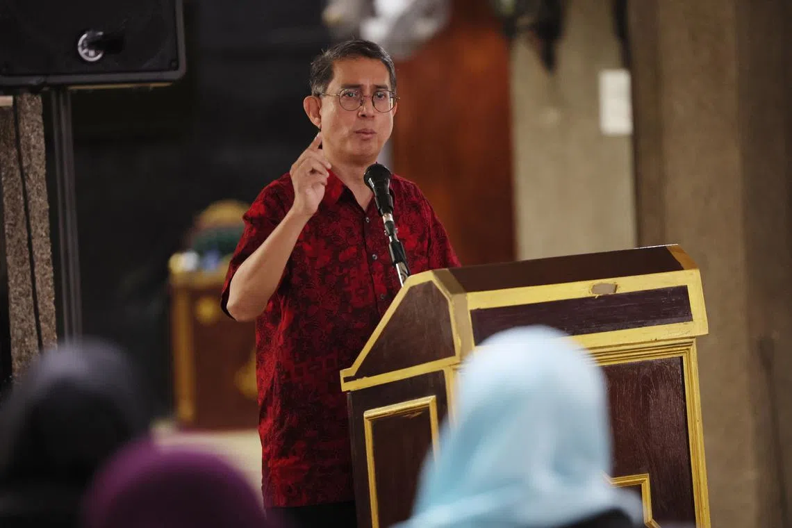 Minister of State for Home Affairs Muhammad Faishal Ibrahim speaking at the ceremony at Masjid Darul Aman on March 3.