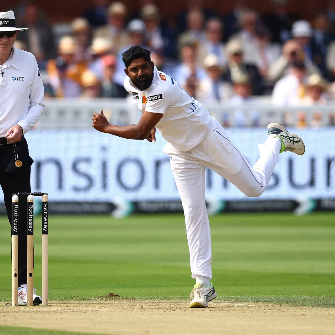 FILE PHOTO: Cricket - Second Test - England v Sri Lanka - Lord's Cricket Ground, London, Britain - August 30, 2024 Sri Lanka's Prabath Jayasuriya in action Action Images via Reuters/Andrew Boyers/File Photo