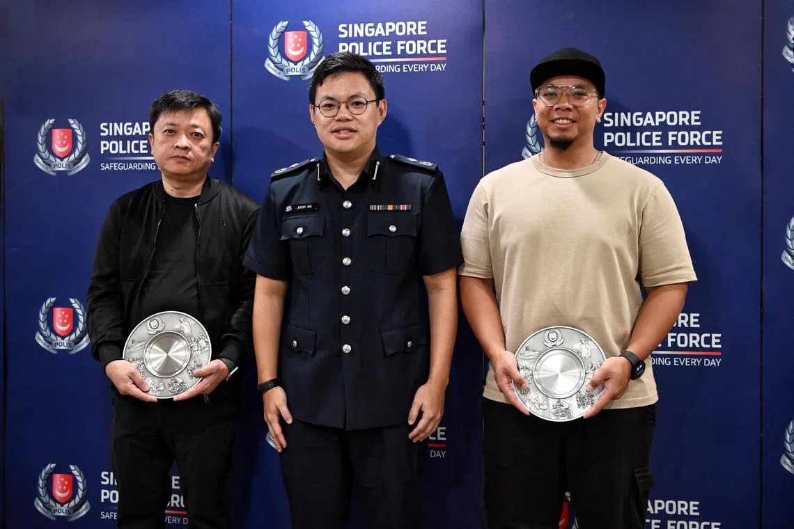 ST20230427_202394376646 Kua Chee Siong/ jlaward27/ 
Commander of Central Police Division, Assistant Commissioner of Police (AC), Jeremy Ang presenting the public spiritedness award to Mr Tan Tjoa Teng (left) and Mr Muhammed Shahadan Bin Sharom (right) at the Police Cantonment Complex on April 27, 2023. 
A man who stepped forward to stop a fight involving an axe-wielding man, as well as another man who managed to save a victim from suicide, will be awarded the Public Spiritedness Award (PSA) this Thursday.