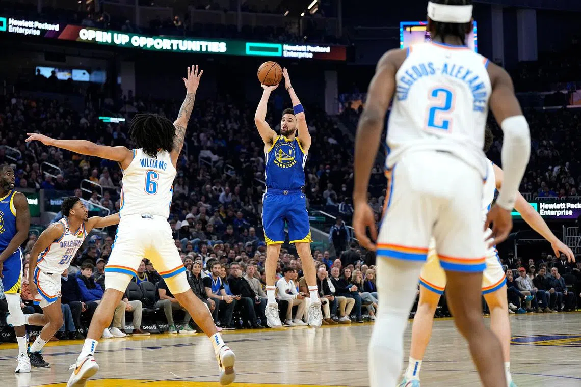 The Golden State Warriors' Klay Thompson shoots against the Oklahoma City Thunder during the first quarter at Chase Centre on Feb 6, 2023.