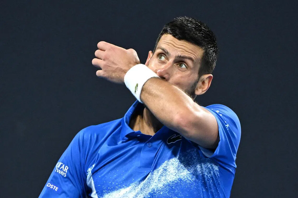Novak Djokovic of Serbia gesturing during his quarter-final defeat by Reilly Opelka of the United States at the Brisbane International tennis tournament on Jan 3.