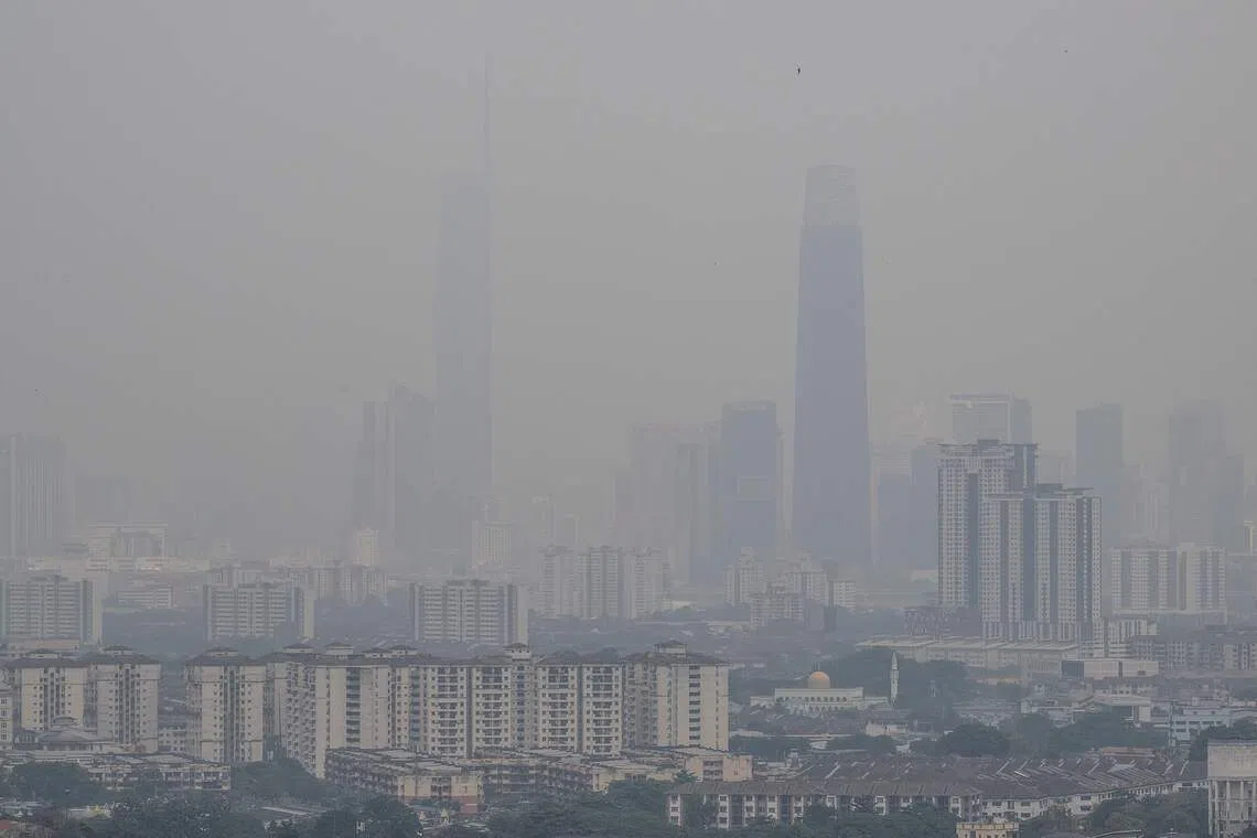 Haze shrouds the Kuala Lumpur skyline as seen from Ampang, in Malaysia’s Selangor state, on Sept 3.