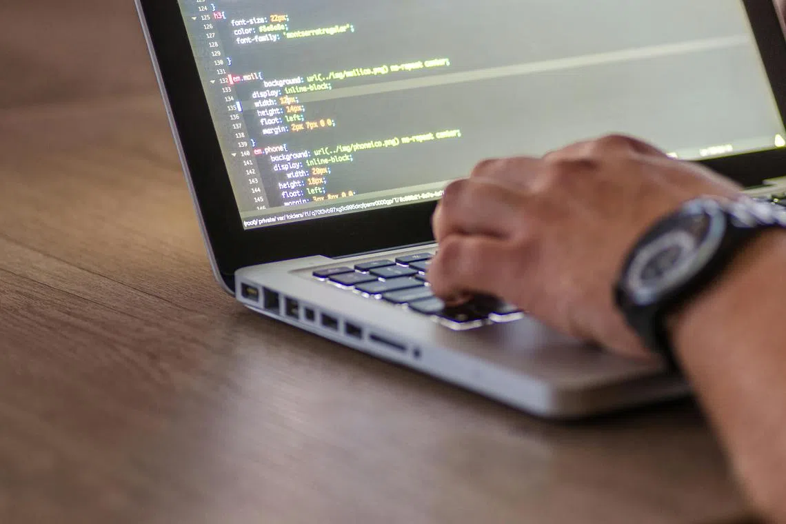 The vibe coding trend seems to promise a future where companies can cut back on programmers, but the reality is more complicated, says the writer.