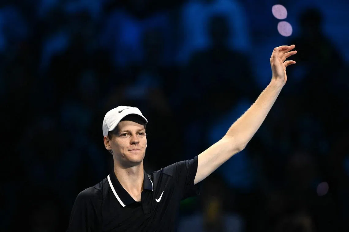 Italy's Jannik Sinner celebrates after winning his match against Australia's Alex de Minaur at the ATP Finals.