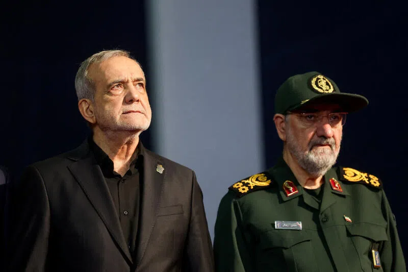 Iranian President Masoud Pezeshkian and adviser to Iran’s supreme leader, Mohsen Rezaei, at a farewell ceremony for Iran’s late Supreme Leader Ayatollah Ali Khamenei on July 3, in Tehran.