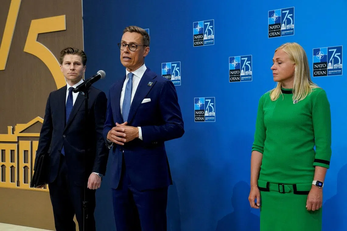 FILE PHOTO: Finland's President Alexander Stubb is joined by Finland's Foreign Minister Elina Valtonen and Defense Minister Antti Hakkanen, as he delivers remarks at NATO's 75th anniversary summit in Washington, U.S., July 10, 2024. REUTERS/Elizabeth Franz/File Photo