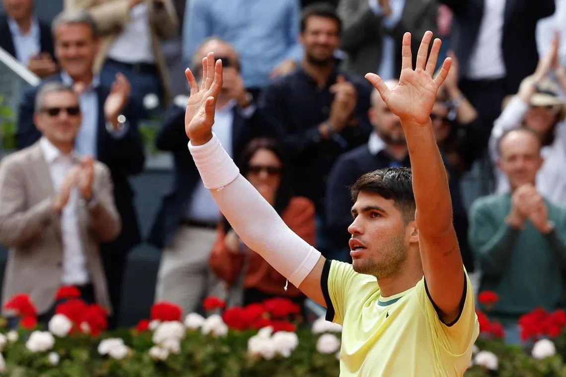 Spain's Carlos Alcaraz celebrates winning his men's singles match against Aleksandr Shevchenko, of Kazakhstan.