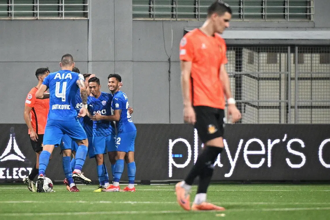 Shawal Anuar pictured with his Lion City Sailors teammates (in blue) against Hougang United at the Jalan Besar Stadium on May 10.