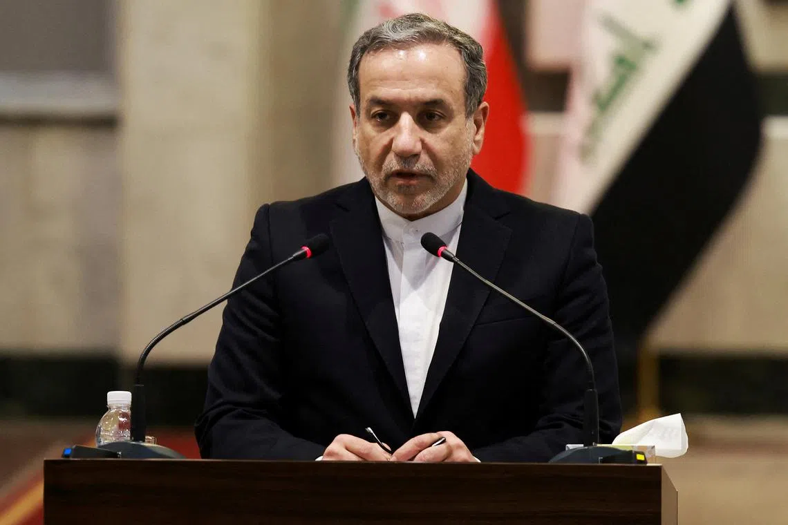 FILE PHOTO: Iran's Foreign Minister Abbas Araqchi speaks as he meets with his Iraqi counterpart Fuad Hussein, in Baghdad, Iraq, October 13, 2024. REUTERS/Ahmed Saad/File Photo