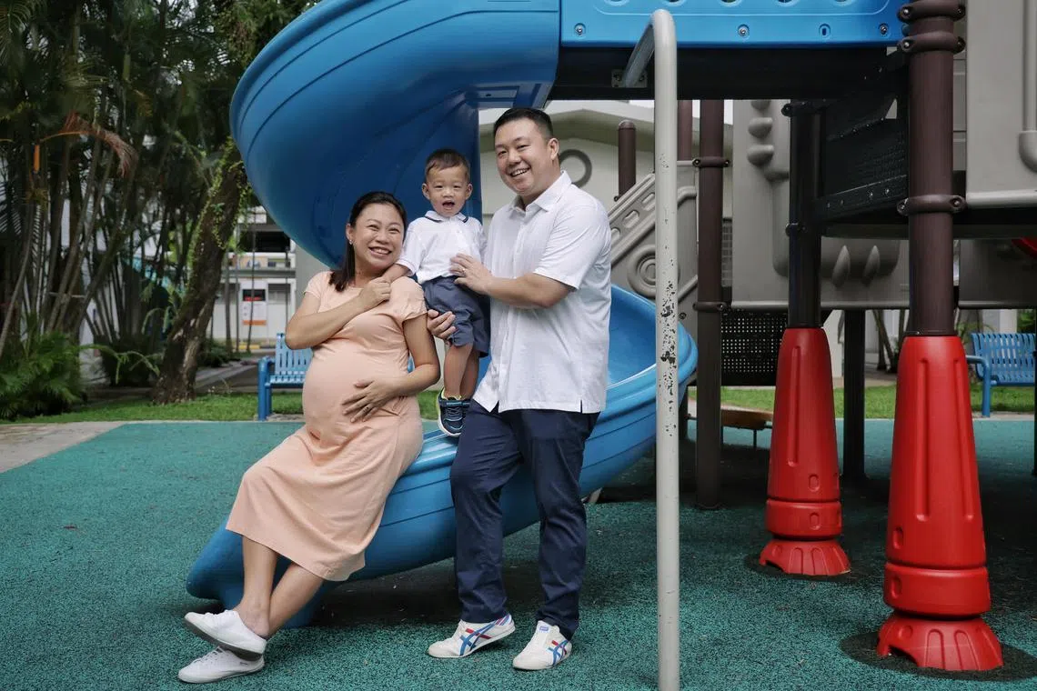 (From left) Ms Lim Wen Ling, 43, her son Evan, two, and husband, Eddy Goh, 41, on May 8, 2024. Ms Lim Wen Ling, 43, and her husband, Eddy Goh, 41, are proud parents to Evan, who is born in April 2022. Wen Ling suffered 5 miscarriages before carrying the baby to term through pre-implementation genetic screening (PGS) IVF. Through this method, problematic embryos, such as those with genetic illnesses, are not implanted to increase the chances of pregnancy etc. Wen Ling is now pregnant with her second child through PGS IVF as well. This is a story on more couples embarking on IVF and KK Women's and Children's Hospital expanding their IVF facilities.