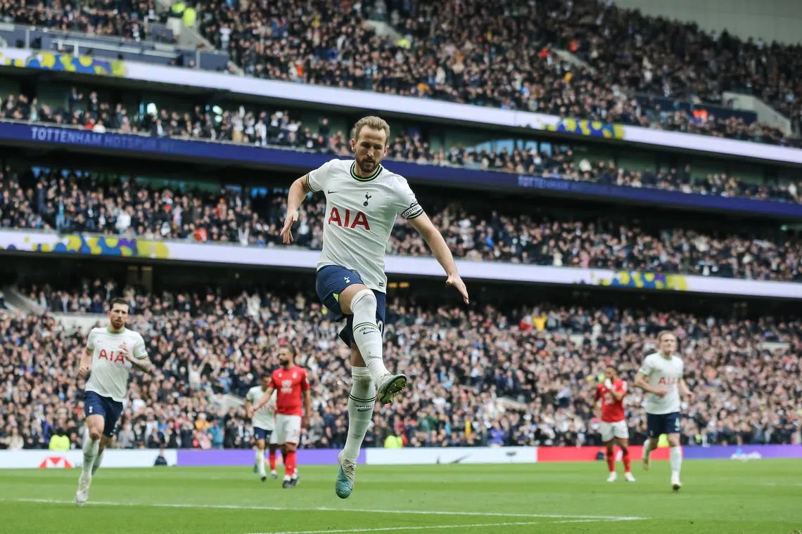 Harry Kane celebrates scoring his second goal for Tottenham from the penalty spot.
