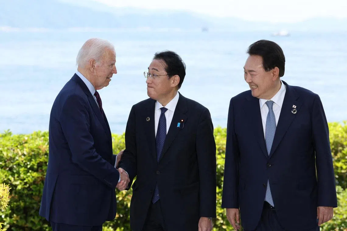 US President Joe Biden (left) with Japan's Prime Minister Fumio Kishida (centre) and South Korean President Yoon Suk Yeol, on the sidelines of a G-7 summit in Japan.