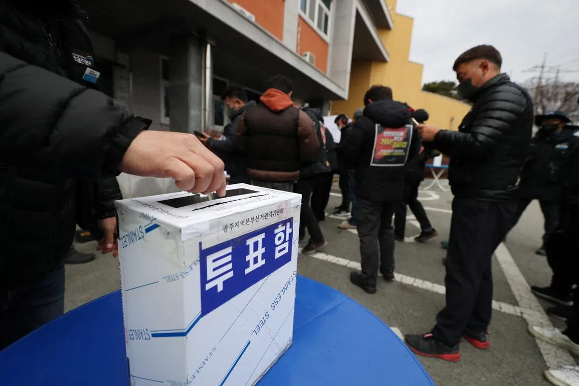 Striking truckers vote on whether to end their strike in Gwangju, South Korea December 9, 2022. Yonhap via REUTERS ATTENTION EDITORS - THIS IMAGE HAS BEEN SUPPLIED BY A THIRD PARTY. SOUTH KOREA OUT. NO RESALES. NO ARCHIVES.