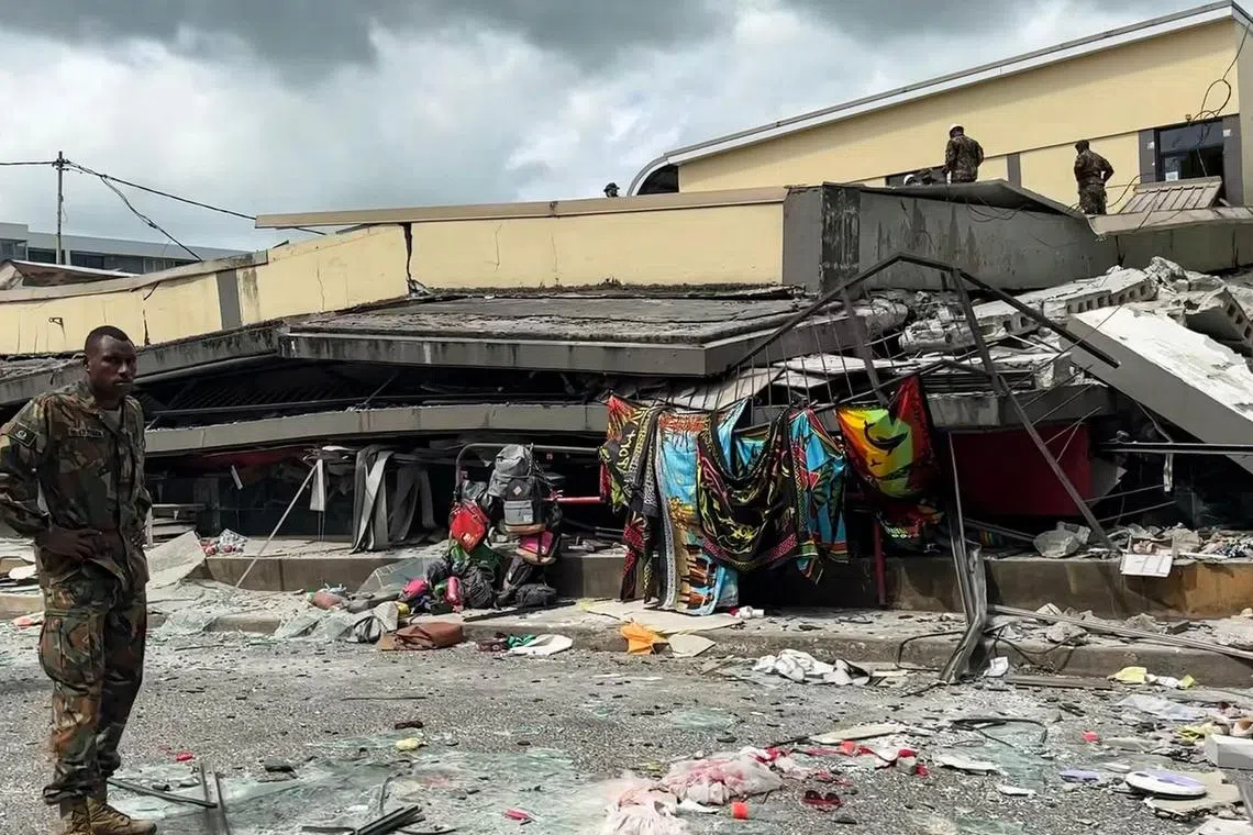 A video screengrab showing a collapsed building in Vanuatu's capital, Port Vila, after a powerful earthquake hit the Pacific island. 